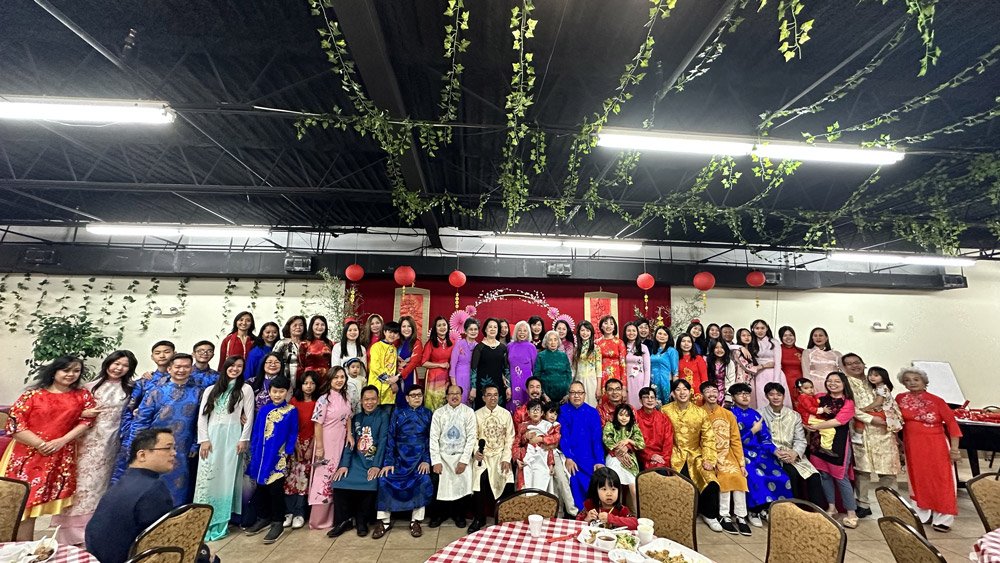 Church family together at a Tết fellowship meal